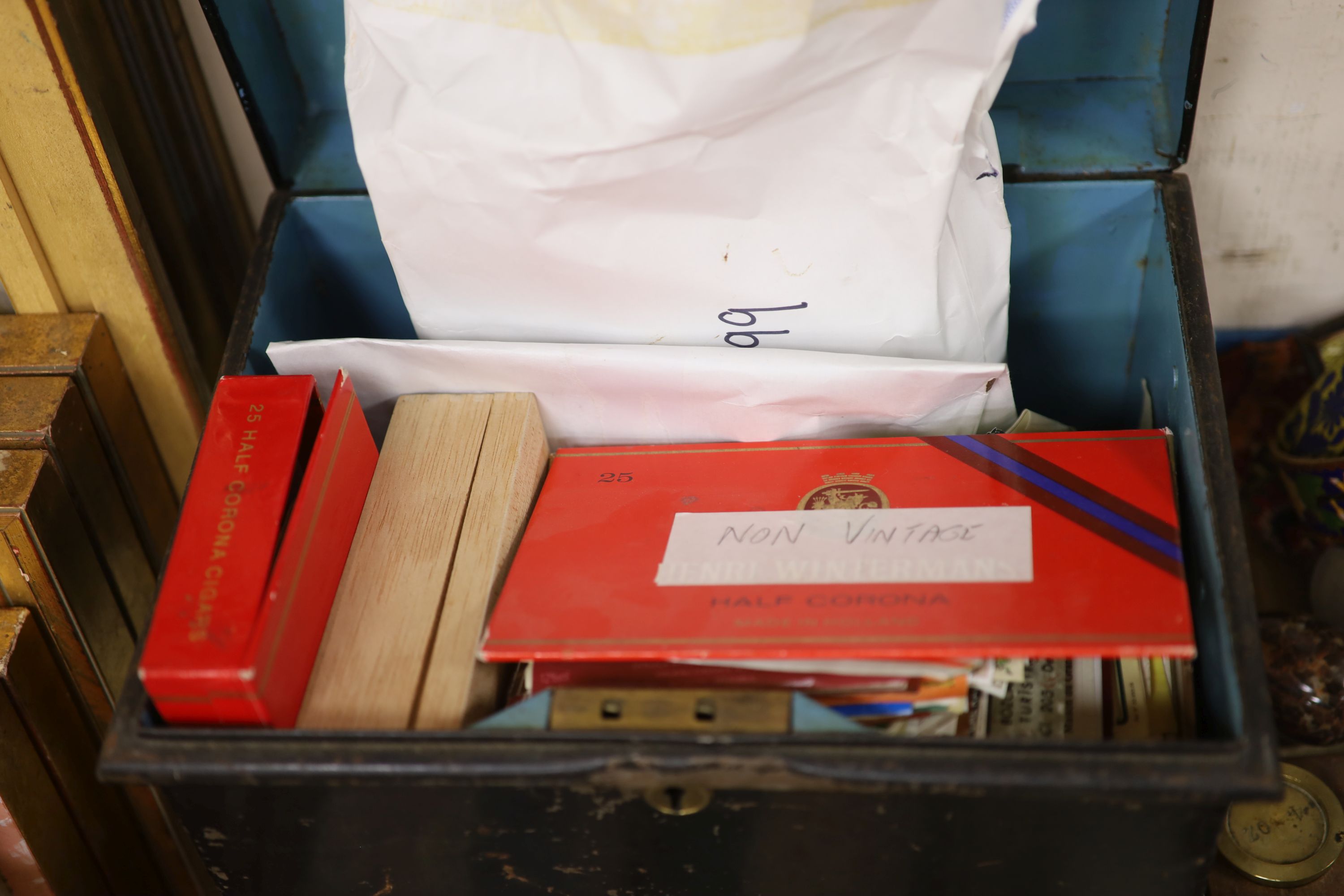A quantity of mixed collectables to include paper wine labels, toy cars, cloisonne, a book, copper pans etc.